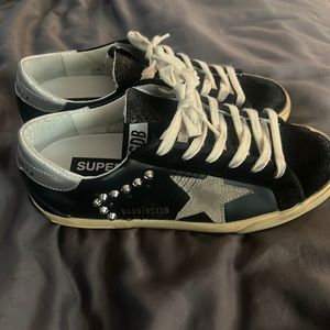 Golden Goose women’s Super Star in black leather and suede with silver studs